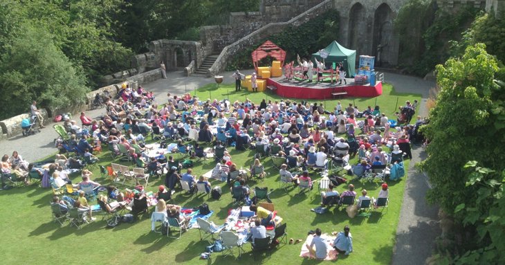 Outdoor theatre performance at Eastnor Castle
