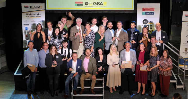 Winners of SGGBA 2022 gather on stage to take the applause at the University of Gloucestershire Business School.