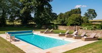 The private heated swimming pool, beautiful lawns and generous dining areas indoors and out make Red Devon House perfect for both relaxing and entertaining.