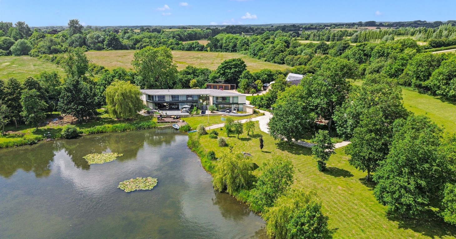 34-acre Cotswolds home with private lake and interiors designed by Laurence Llewelyn-Bowen