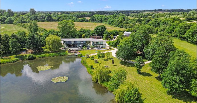 34-acre Cotswolds home with private lake and interiors designed by Laurence Llewelyn-Bowen