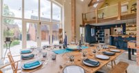 The impressive celebration barn can host elegant meals for up to 16 and is home to a pool table and a football table for some after dinner entertainment.